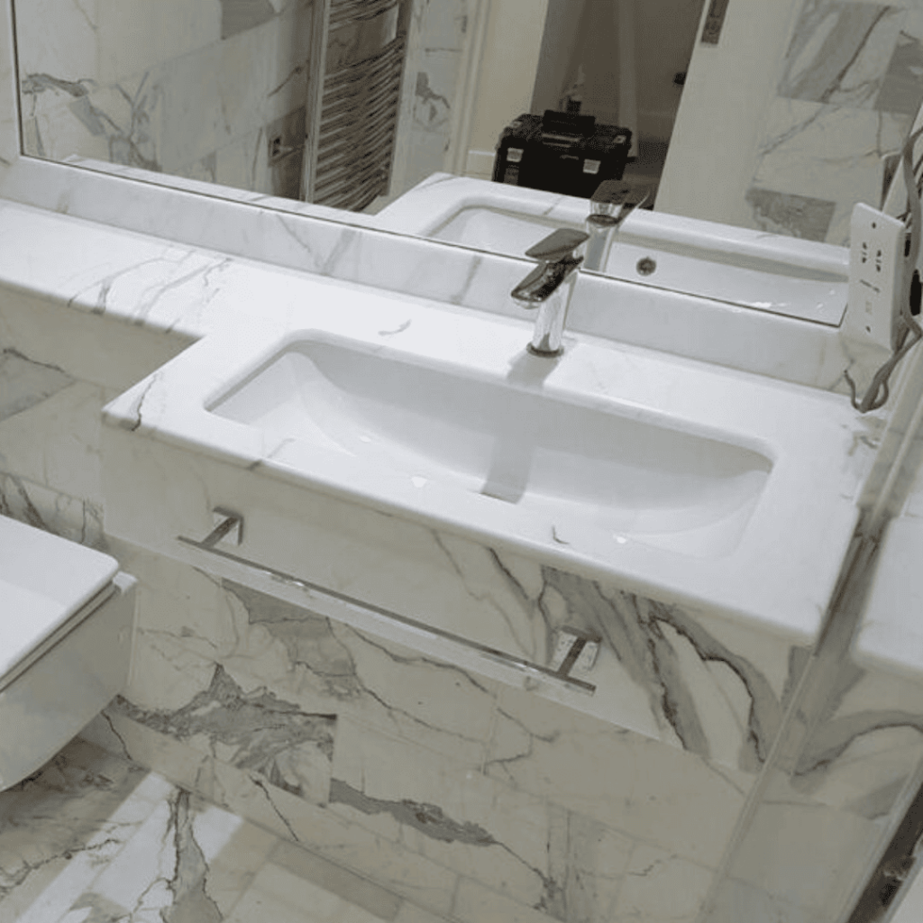 Luxurious bathroom interiors crafted by Marble and Stone London, featuring bespoke designs in marble, granite, quartz, and engineered stone.